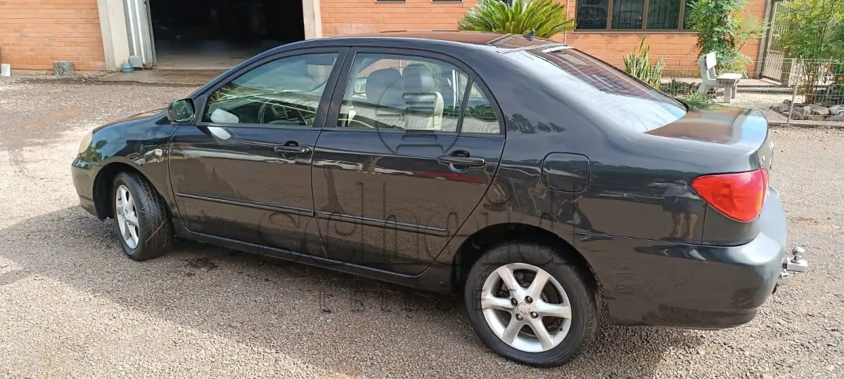 LOTE 005 - Toyota/Corolla XEI 1.8 VVT, placa KAT 0706, preto, ano/modelo 2003