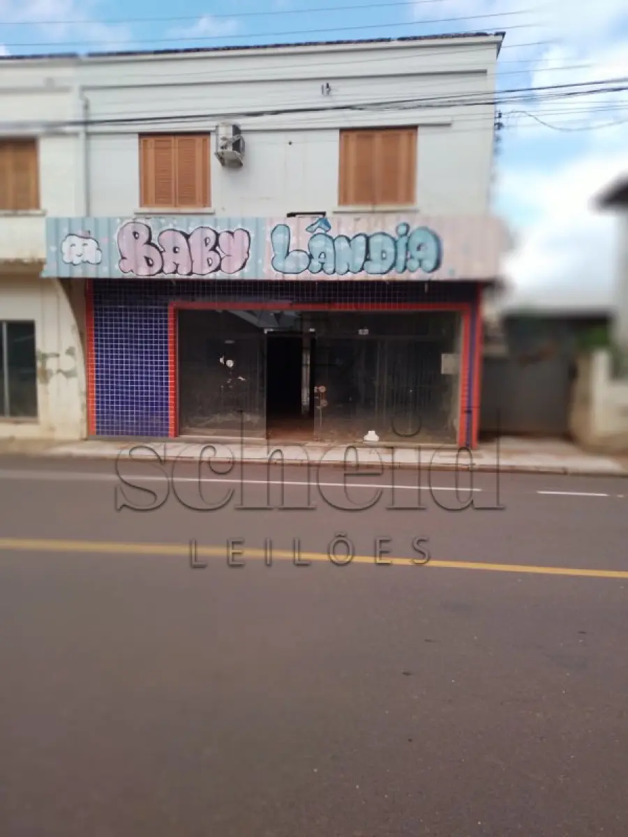 LOTE 001 - Área de 323,75m², contendo um prédio de alvenaria de dois pavimentos com 245,34m² de área construída, situado na Rua Pinheiro Machado, Muçum/RS