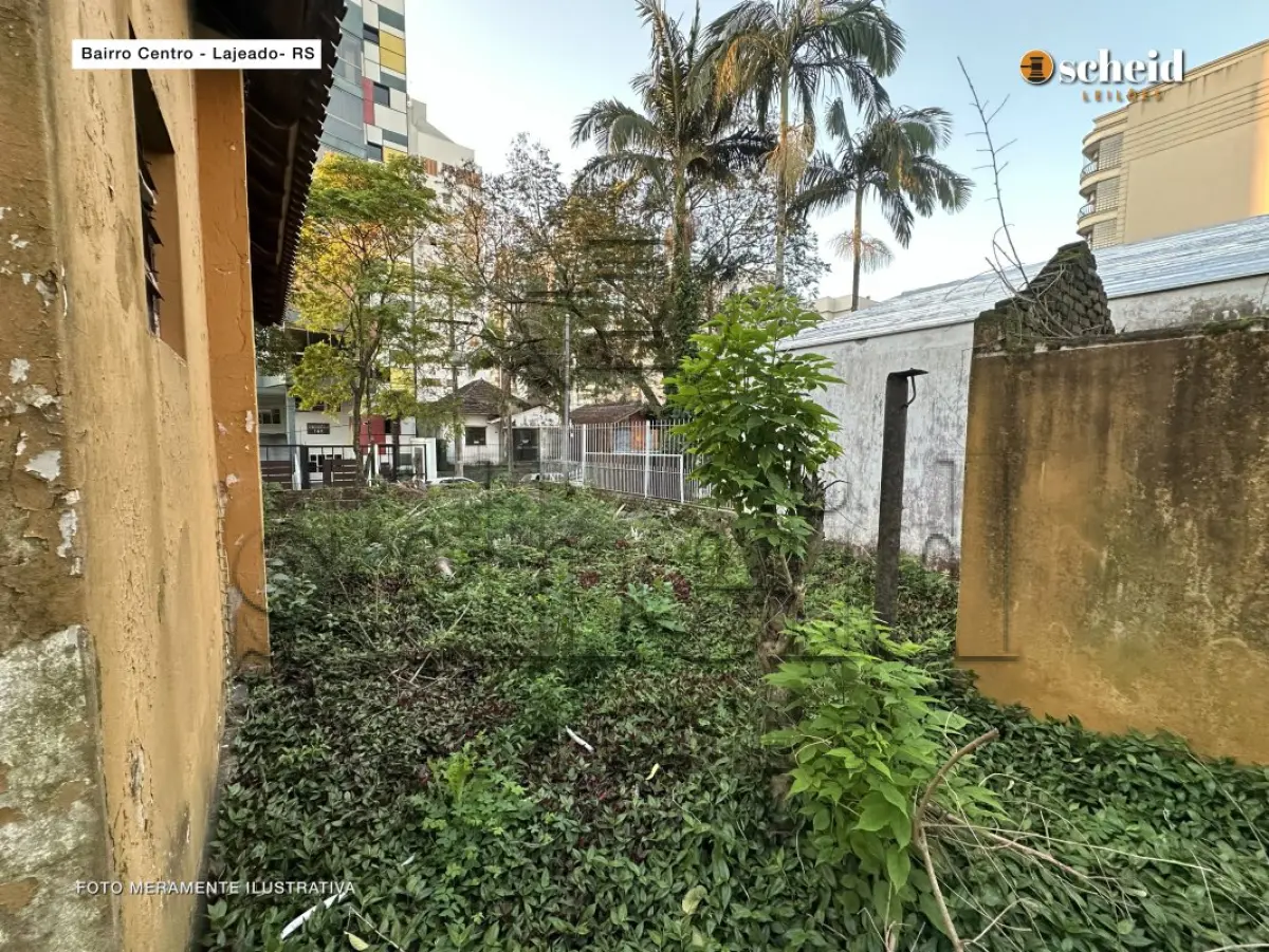 LOTE 001 - Área de 490,23m², contendo uma casa residencial de alvenaria com 77,00m², um galpão de madeira com 11 50m² e um telheiro de madeira com 21,00m², localizado na Rua Pinheiro Machado, nº 198, bairro Centro, Lajeado/RS