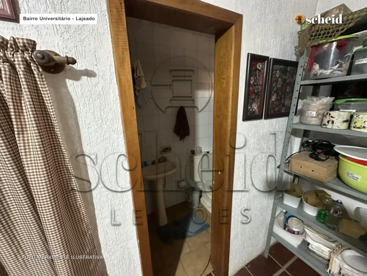 LOTE 001 - Área de 1.804,92m², contendo um prédio de alvenaria de dois pavimentos, medindo 62,34m² o pavimento inferior e 177,78m² o pavimento superior, situado à Rua Sabiá, n° 48, bairro Universitário, Lajeado/RS
