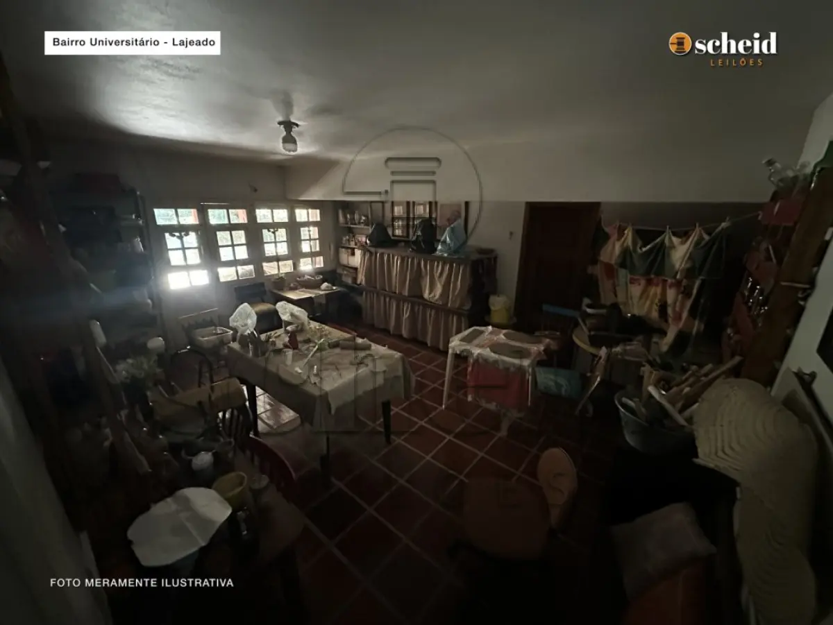 LOTE 001 - Área de 1.804,92m², contendo um prédio de alvenaria de dois pavimentos, medindo 62,34m² o pavimento inferior e 177,78m² o pavimento superior, situado à Rua Sabiá, n° 48, bairro Universitário, Lajeado/RS