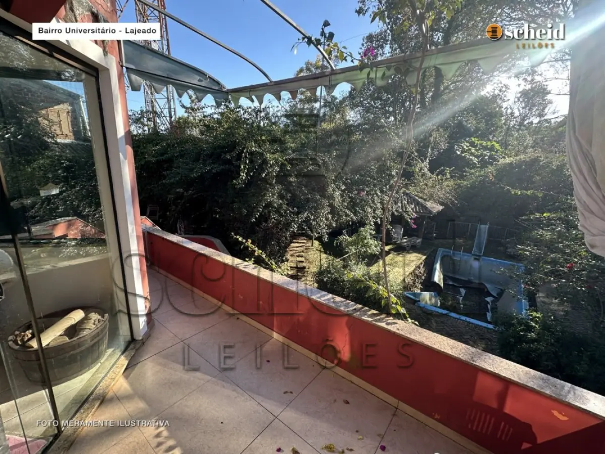 LOTE 001 - Área de 1.804,92m², contendo um prédio de alvenaria de dois pavimentos, medindo 62,34m² o pavimento inferior e 177,78m² o pavimento superior, situado à Rua Sabiá, n° 48, bairro Universitário, Lajeado/RS