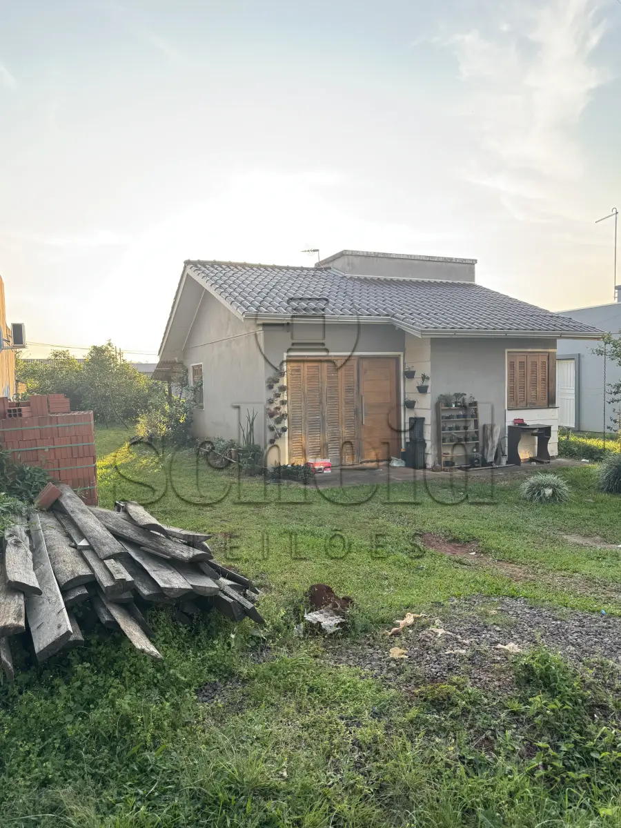 LOTE 012 - Área de 459,17m², contendo um prédio residencial de alvenaria com 45,12m², localizada na Rua Eloi Pacheco, nº 16, bairro Canabarro, Teutônia/RS