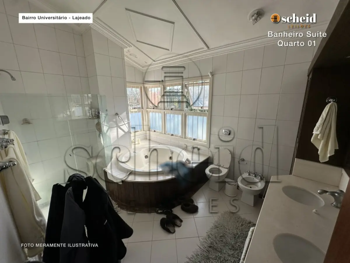 LOTE 001 - Área de 1.804,92m², contendo um prédio de alvenaria de dois pavimentos, medindo 62,34m² o pavimento inferior e 177,78m² o pavimento superior, situado à Rua Sabiá, n° 48, bairro Universitário, Lajeado/RS