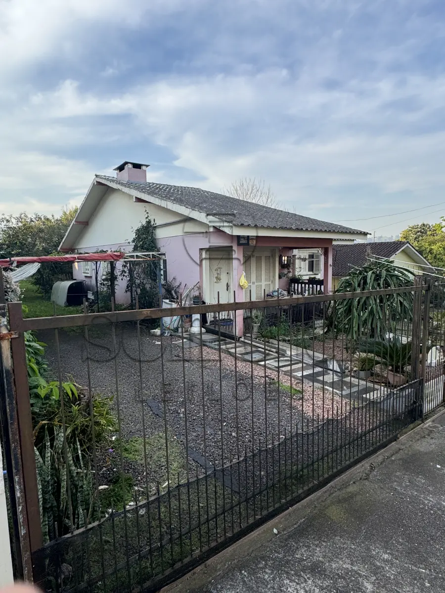 LOTE 013 - Área de 572,00m², contendo uma edificação de alvenaria de aproximadamente 111,74m², localizado na Rua Geraldo Snell, n° 932, bairro Teutônia, Teutônia/RS