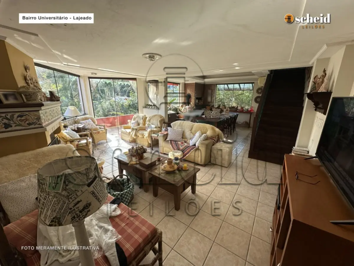 LOTE 001 - Área de 1.804,92m², contendo um prédio de alvenaria de dois pavimentos, medindo 62,34m² o pavimento inferior e 177,78m² o pavimento superior, situado à Rua Sabiá, n° 48, bairro Universitário, Lajeado/RS