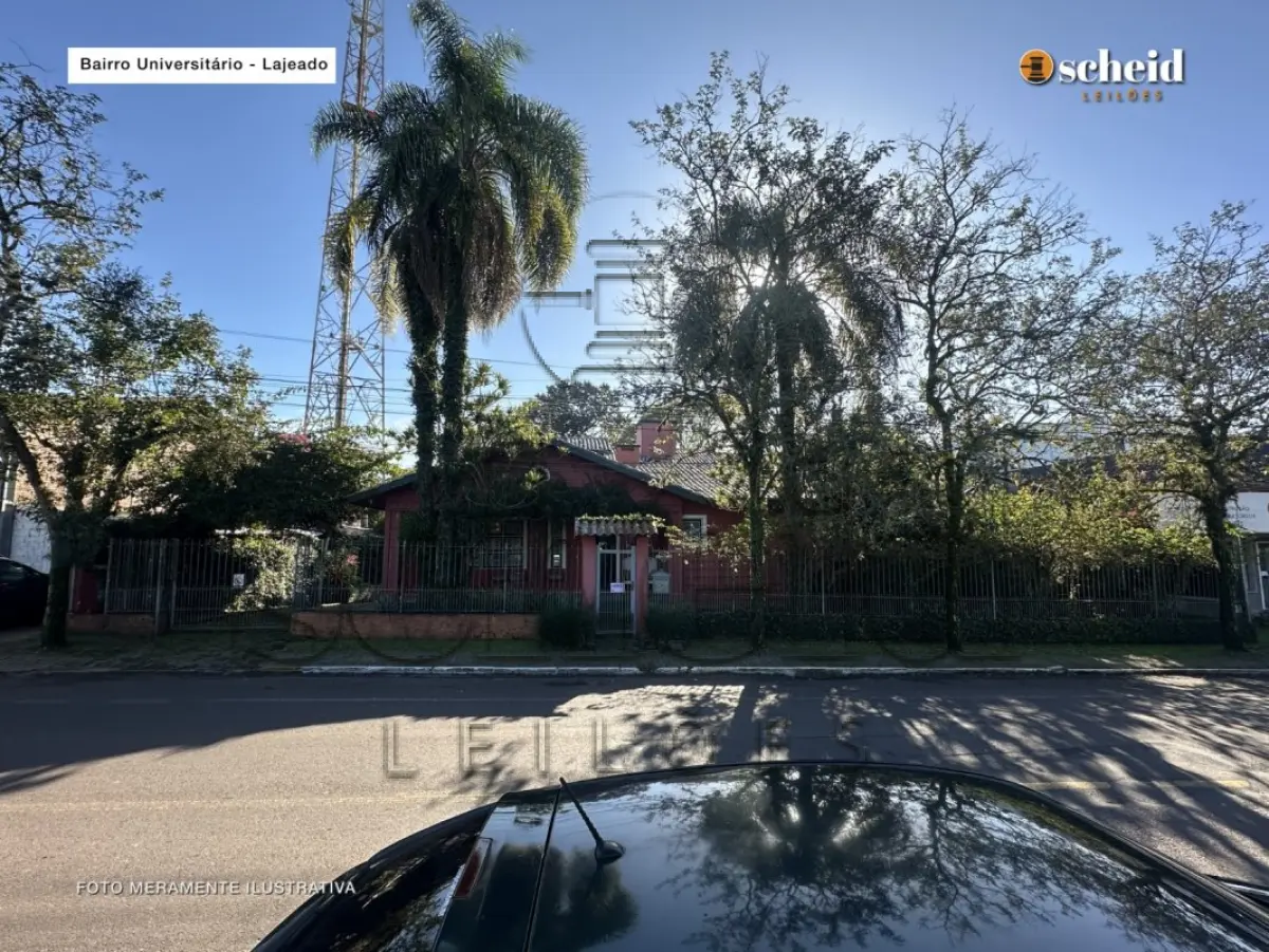 LOTE 001 - Área de 1.804,92m², contendo um prédio de alvenaria de dois pavimentos, medindo 62,34m² o pavimento inferior e 177,78m² o pavimento superior, situado à Rua Sabiá, n° 48, bairro Universitário, Lajeado/RS