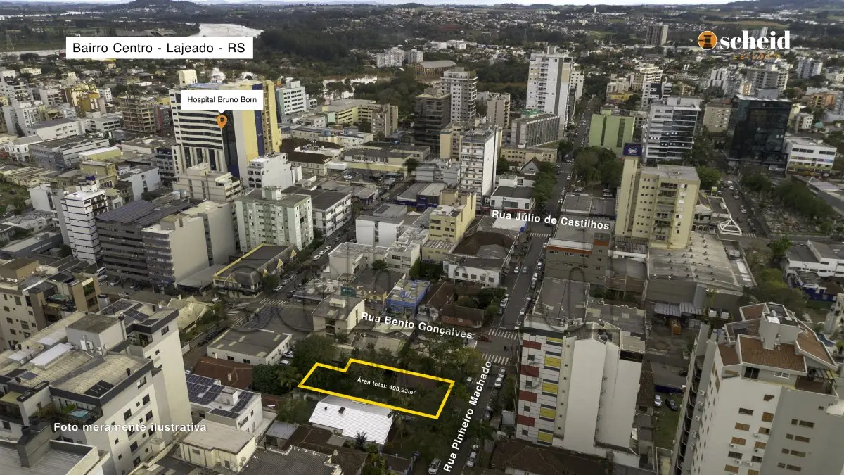 LOTE 001 - Área de 490,23m², contendo uma casa residencial de alvenaria com 77,00m², um galpão de madeira com 11 50m² e um telheiro de madeira com 21,00m², localizado na Rua Pinheiro Machado, nº 198, bairro Centro, Lajeado/RS