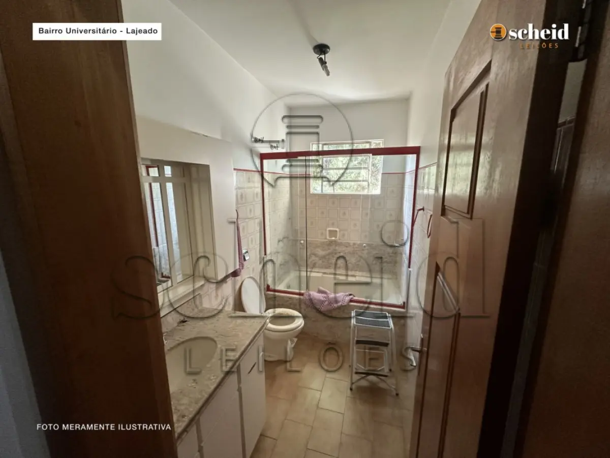 LOTE 001 - Área de 1.804,92m², contendo um prédio de alvenaria de dois pavimentos, medindo 62,34m² o pavimento inferior e 177,78m² o pavimento superior, situado à Rua Sabiá, n° 48, bairro Universitário, Lajeado/RS