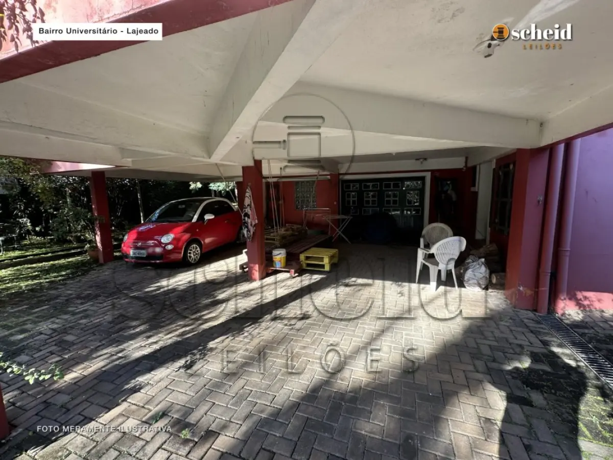 LOTE 001 - Área de 1.804,92m², contendo um prédio de alvenaria de dois pavimentos, medindo 62,34m² o pavimento inferior e 177,78m² o pavimento superior, situado à Rua Sabiá, n° 48, bairro Universitário, Lajeado/RS