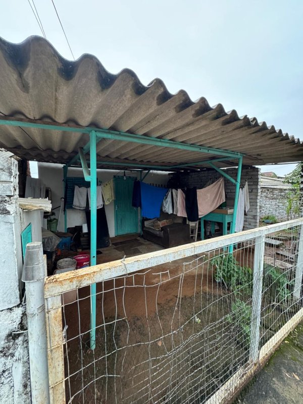 LOTE 005 - Área de 180,00m², contendo uma construção residencial de alvenaria com a superfície de 22,79m², localizado na Rua Henrique Schmitt, nº 995, bairro São Francisco, Bom Retiro do Sul/RS